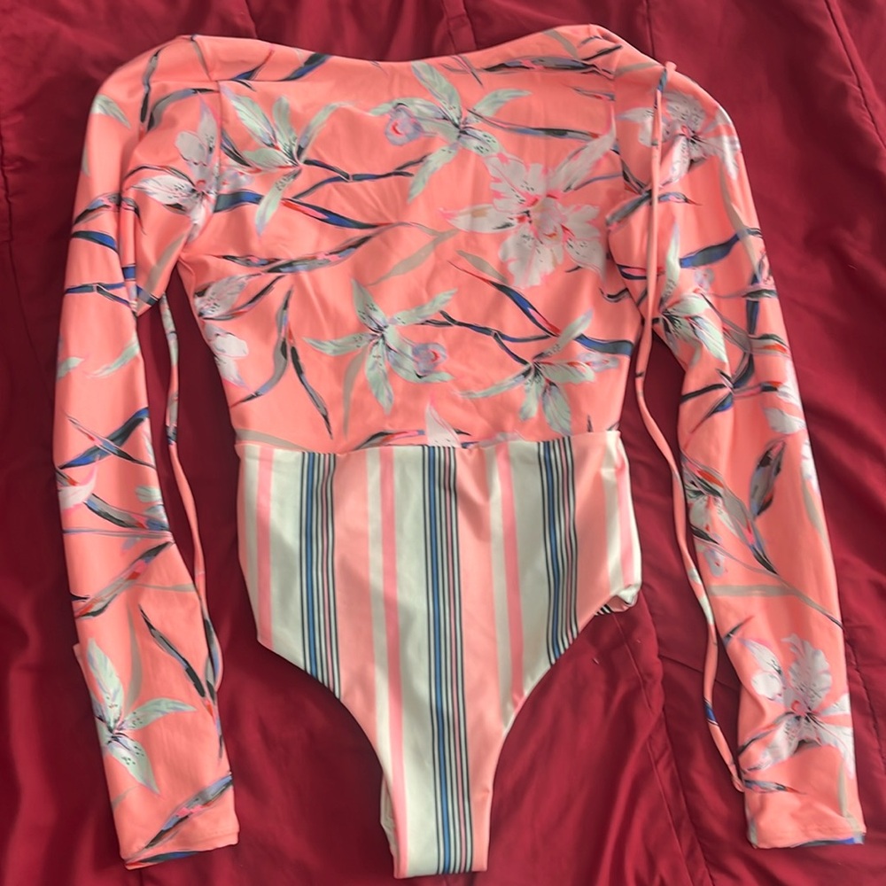 Maaji one piece, reversible swimsuit. Long sleeve and new with tags.